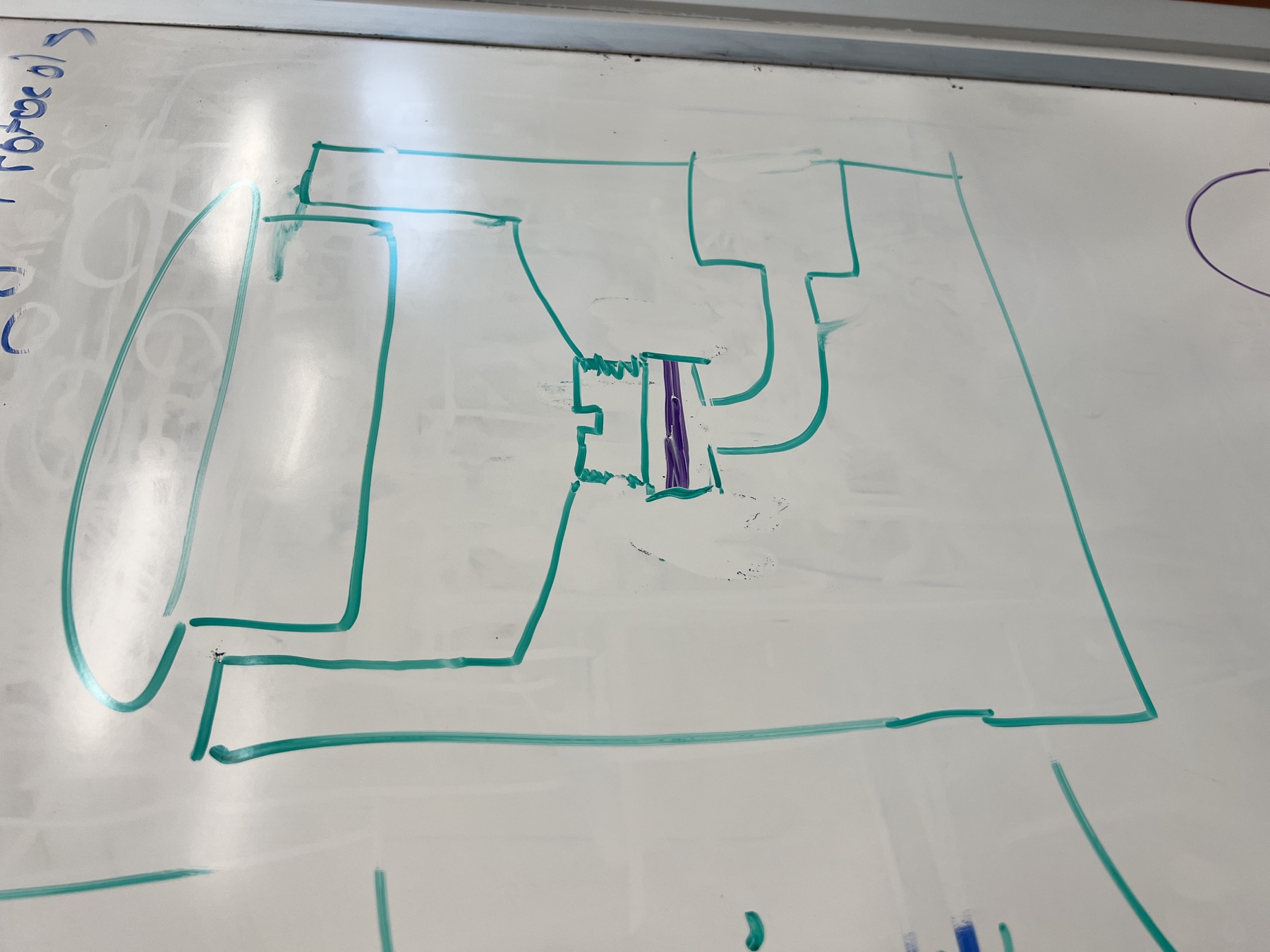 Whiteboard sketch of the reaction chamber design